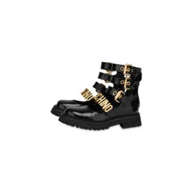 Shop Moschino Lettering Multi-straps Calfskin Ankle Boots In Black