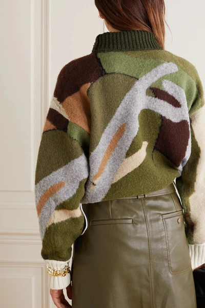 Shop Sacai + Kaws Cropped Shell-trimmed Jacquard-knit Wool Turtleneck Sweater In Green
