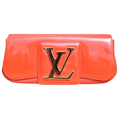 Pre-owned Louis Vuitton Sobe Patent Leather Clutch Bag In Orange