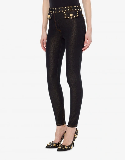 Shop Moschino Teddy Buttons Stretch Denim Trousers In Black
