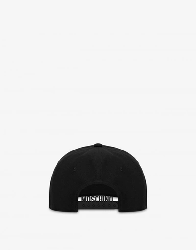 Shop Moschino Painted Logo Canvas Hat In Black