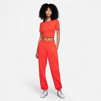 Shop Nike Women's Sportswear Essential Fleece Jogger Pants In Chile Red/white