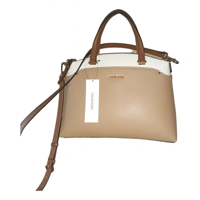 Leather handbag Calvin Klein Beige in Leather - 25635158
