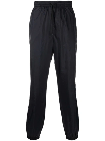 Msgm Logo-print Tapered Track Pants In Schwarz