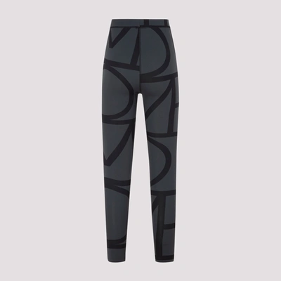 Shop Totême Monogram Leggings Pants In Black