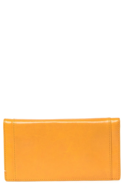 Shop Hobo Cape Leather Wallet In Mustard