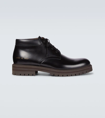 Shop Common Projects Combat Derby Boots In Black