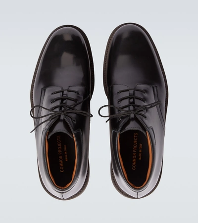 Shop Common Projects Combat Derby Boots In Black