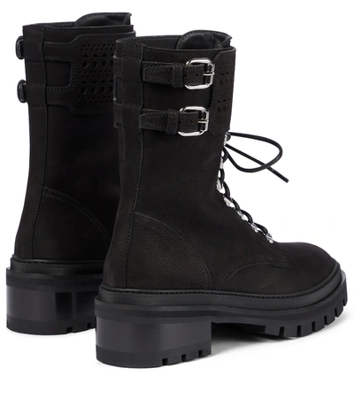 Shop Alaïa Laser-cut Leather Boots In Noir