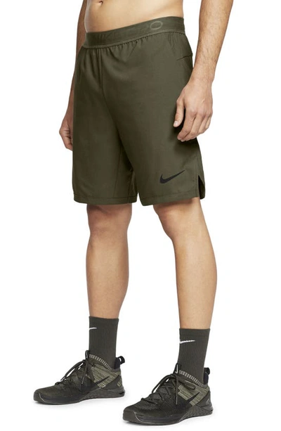 Shop Nike Dri-fit Pro Flex Vent Max Athletic Shorts In Rough Green/ Black
