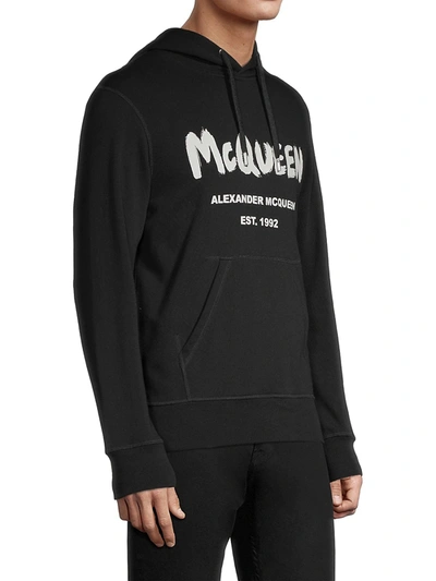 Shop Alexander Mcqueen Men's Graffiti Print Logo Hoodie In Black