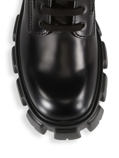 Shop Prada Men's Monolith Lug-sole Leather Combat Boots In Black