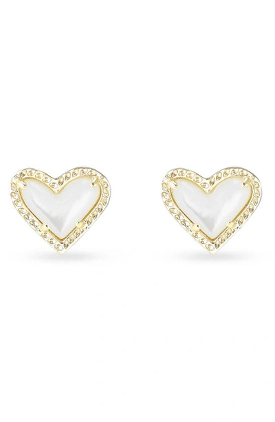 Shop Kendra Scott Ari Heart Stud Earrings In Gold/ Ivory Mother Of Pearl