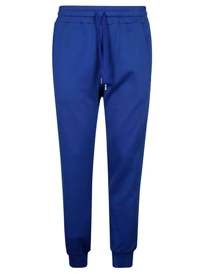 Shop Dolce & Gabbana Logo Patched Plain Track Pants In Bluette Scuro