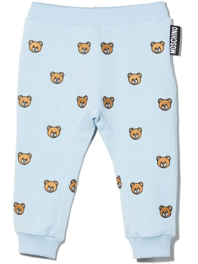 Shop Moschino Embroidered Toy Bear Trousers In 蓝色