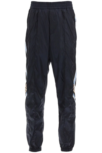 Shop Versace Technical Jogger Pants In Navy Blue Multicolor (blue)