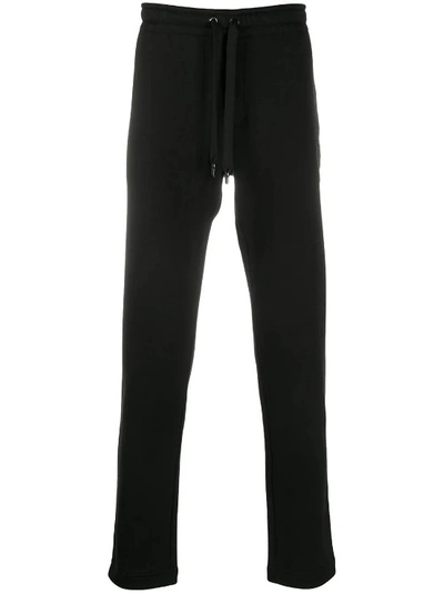 Shop Dolce & Gabbana Dg Crest Print Track Pants In Black