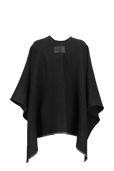 Shop Burberry Solid - Wool Cape With Jacquard Monogram Pattern In Black