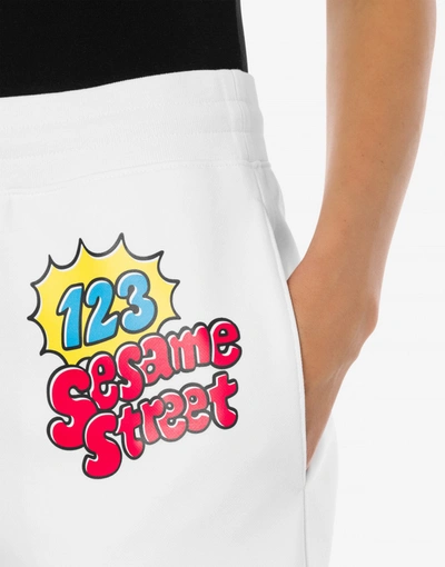 Shop Moschino Sesame Street© Fleece Shorts In White