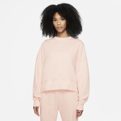 Shop Nike Sportswear Collection Essentials Women's Oversized Fleece Crew In Pale Coral,white