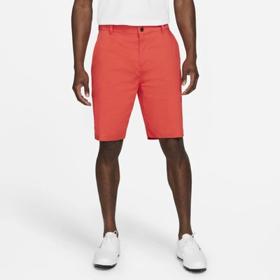 Shop Nike Dri-fit Uv Men's 10.5" Golf Chino Shorts In Track Red