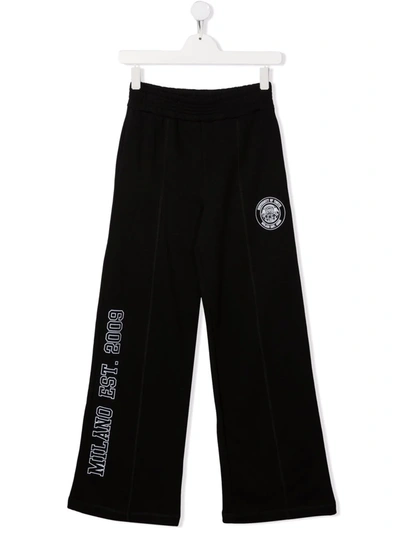 Shop Msgm Logo-print Wide-leg Cotton Track Pants In Black