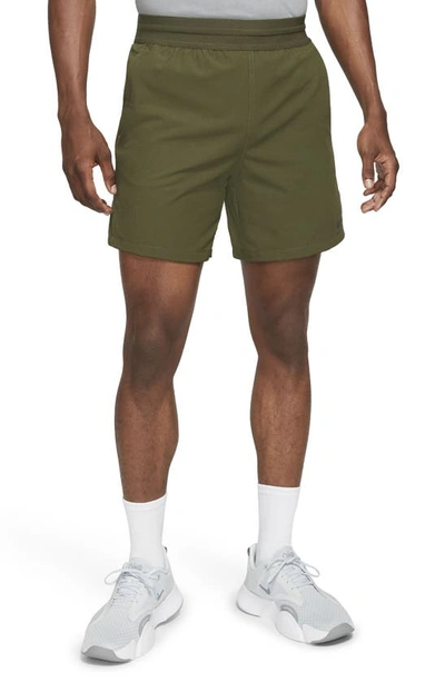 Shop Nike Pro Dri-fit Hybrid Athletic Shorts In Rough Green/black