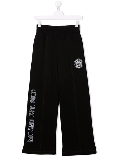 Shop Msgm Teen Logo Print Wide Trousers In 黑色