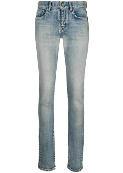 Shop Saint Laurent Denim Low-rise Skinny Jeans In Blue