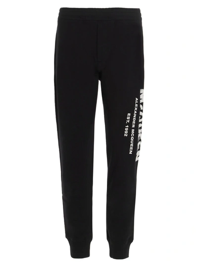 Shop Alexander Mcqueen Graffiti Logo Print Track Pants In Black