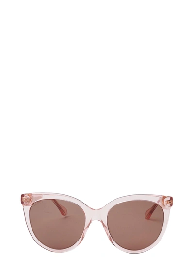 Shop Gucci Gg0565s Transparent Pink Sunglasses
