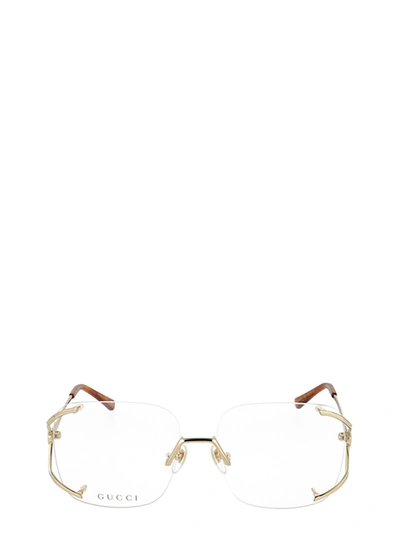 Shop Gucci Gg0652o Gold Glasses