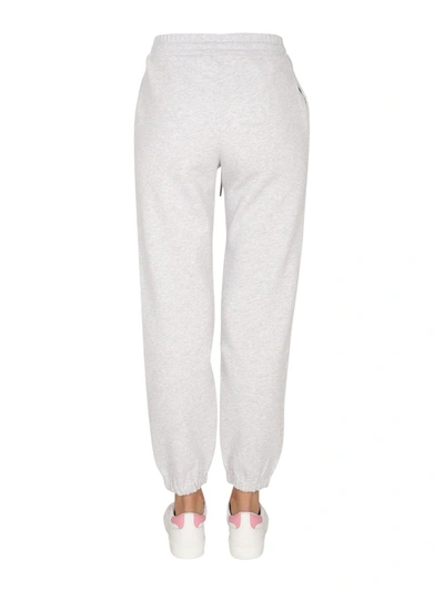 Shop Msgm Jogging Pants With Logo Print In Grey