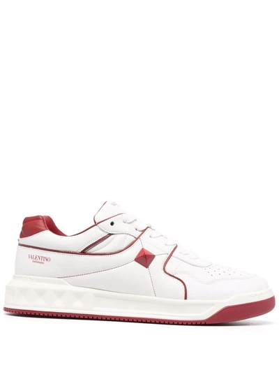 Shop Valentino Roman Stud Low-top Sneakers In Weiss