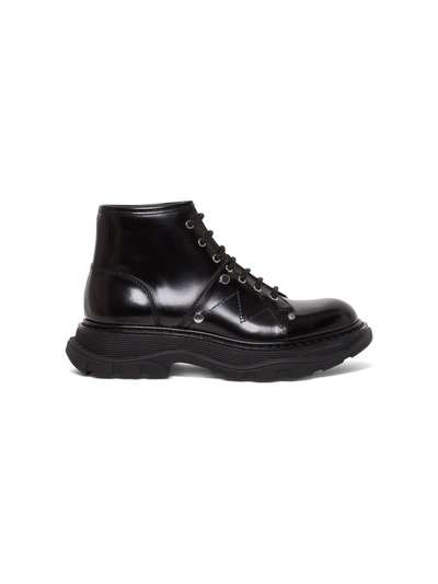 Shop Alexander Mcqueen Ankle Boots With Laces And Tread Sole In Black