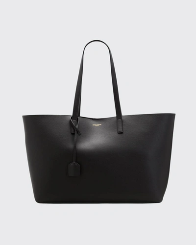 Shop Saint Laurent East West Calfskin Shopping Tote Bag In Black