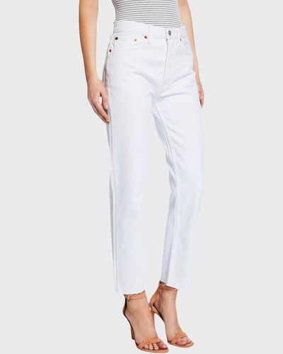Shop Re/done High-rise Stovepipe Raw-edge Cropped Jeans In White
