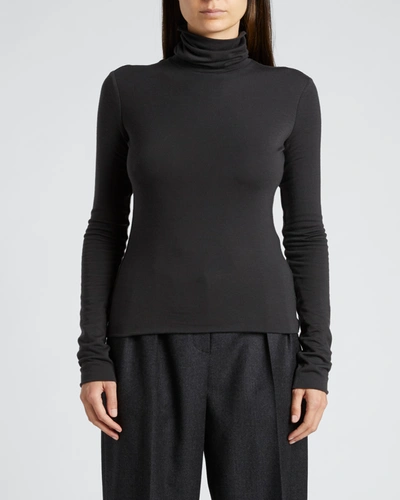 Shop The Row Dembe Jersey Turtleneck Top In Smokey Brown