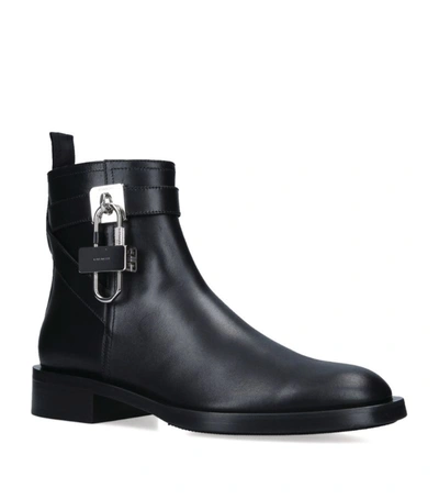 Shop Givenchy Leather Lock Ankle Boots In Black
