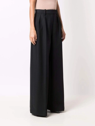 Shop Khaite Trousers Black