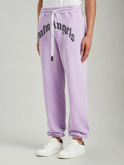 Shop Palm Angels Trousers Lilac