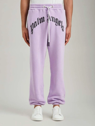 Shop Palm Angels Trousers Lilac