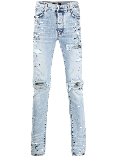 Shop Amiri Distressed-effect Skinny Jeans In Blau