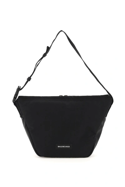 Shop Balenciaga Recycled Nylon Oversize Sling Bag In Black