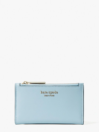 Shop Kate Spade Spencer Small Slim Bifold Wallet In Teacup Blue