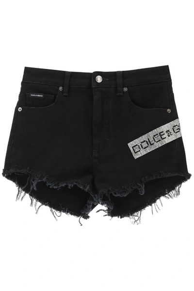 Shop Dolce & Gabbana Denim Shorts With Crystal Logo In Black