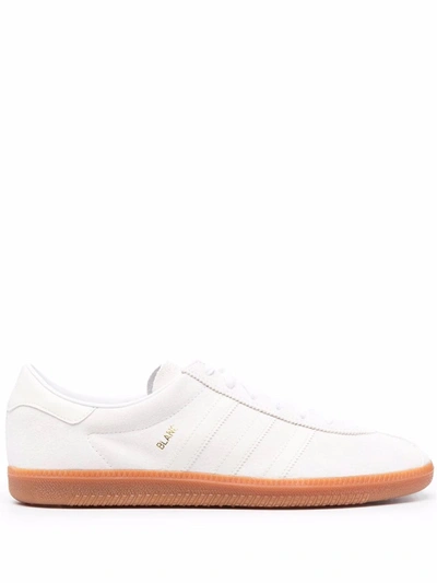 Adidas white shoes with brown sole best sale