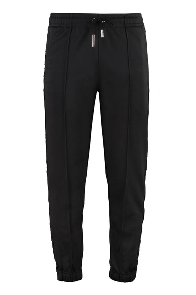 Shop Givenchy Track-pants With Side Logo Stripes In Black