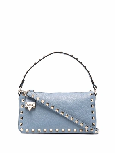 Shop Valentino Rockstud-embellished Shoulder Bag In Blue
