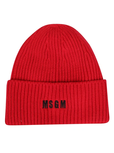 Shop Msgm Logo Embroidered Knitted Beanie In Red